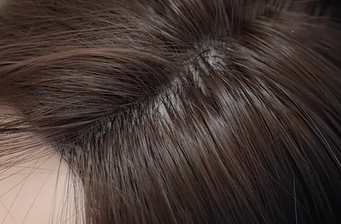 Implanted hair detail on a silicone sex doll